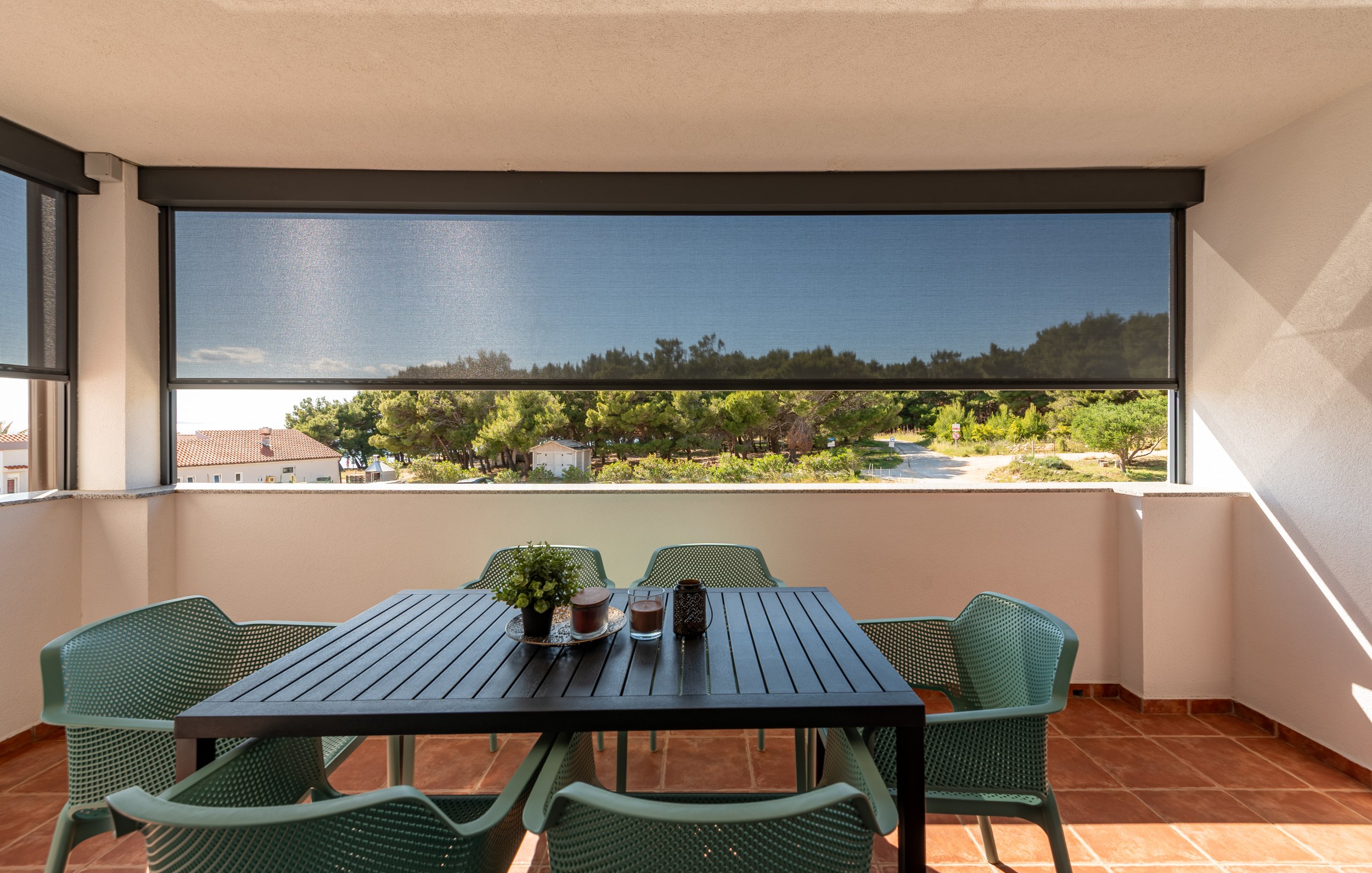 Shaded terrace looking out over the pines, Apartment Blue