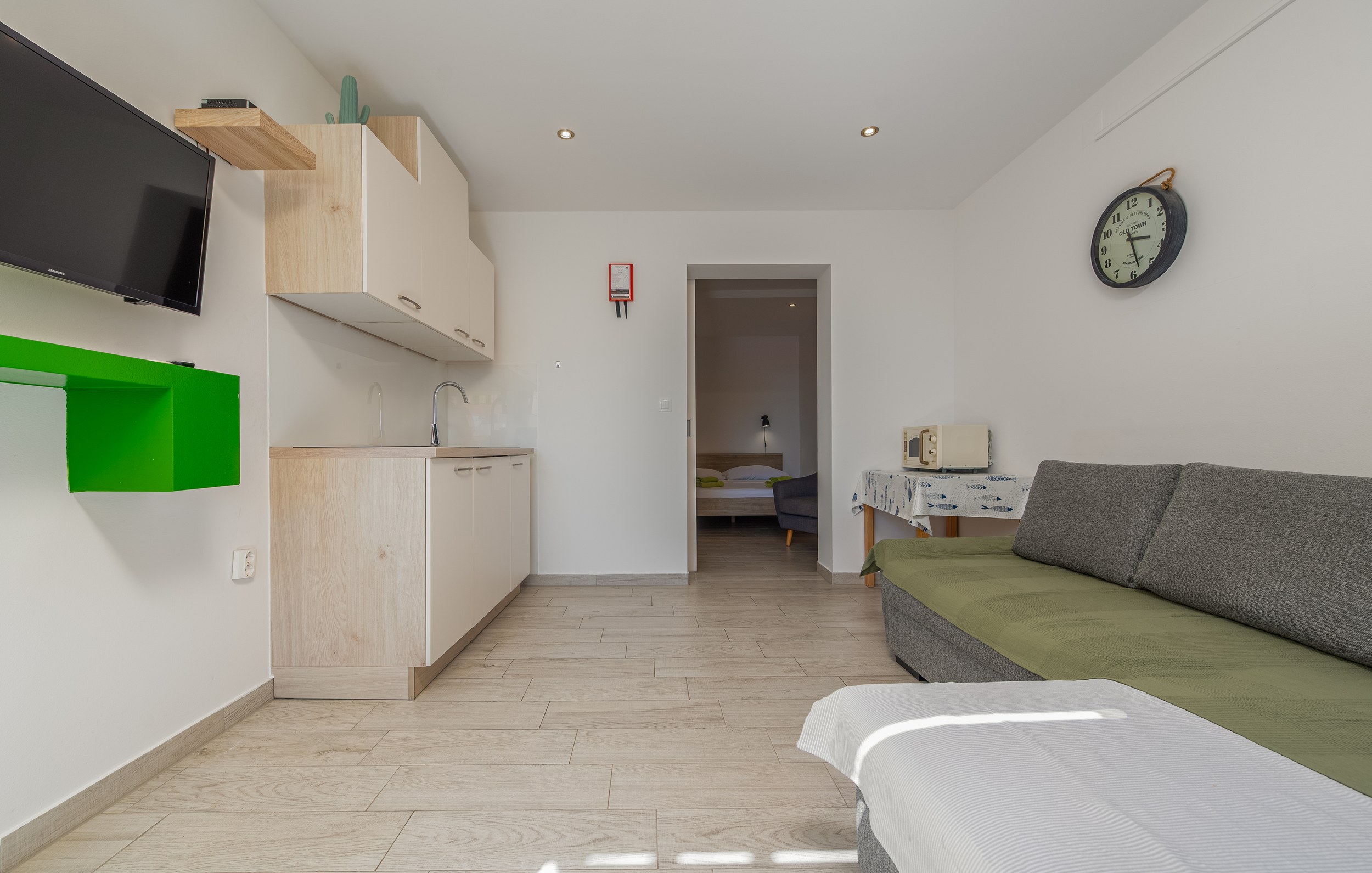 Living room opening onto the sea-view terrace, Apartment Yellow