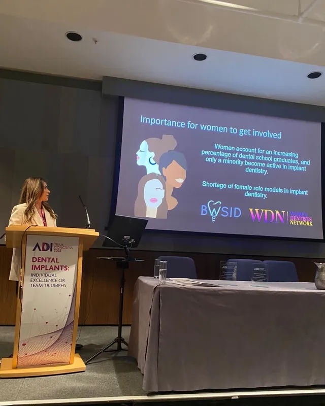Dr Payvand Menhadji lecturing at the ADI Team Congress 2023 on women in implant dentistry