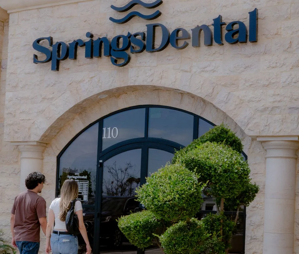 Patients arriving beneath the Springs Dental sign in Summerlin