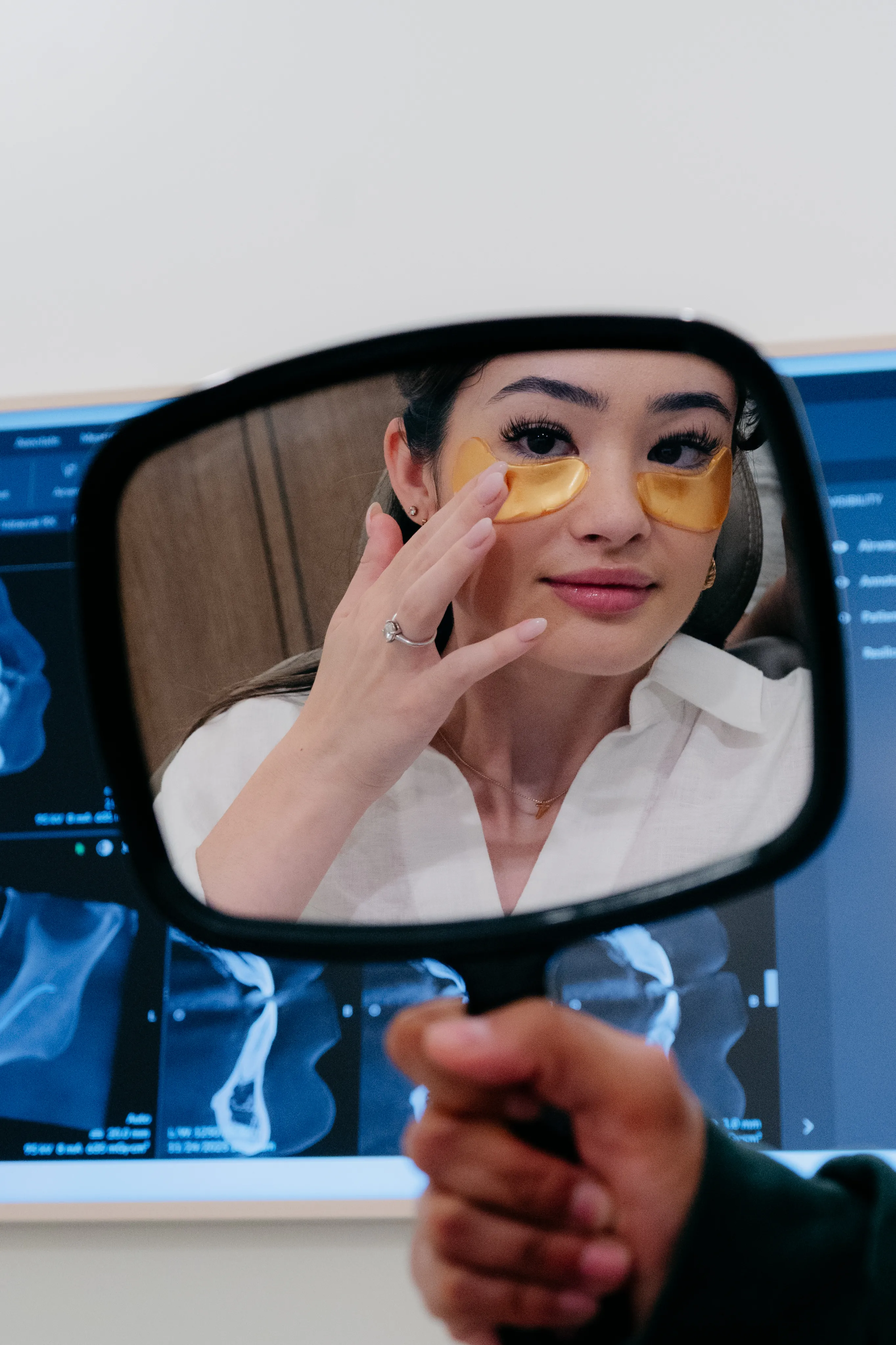 Patient enjoying under-eye masks during a Springs Dental visit