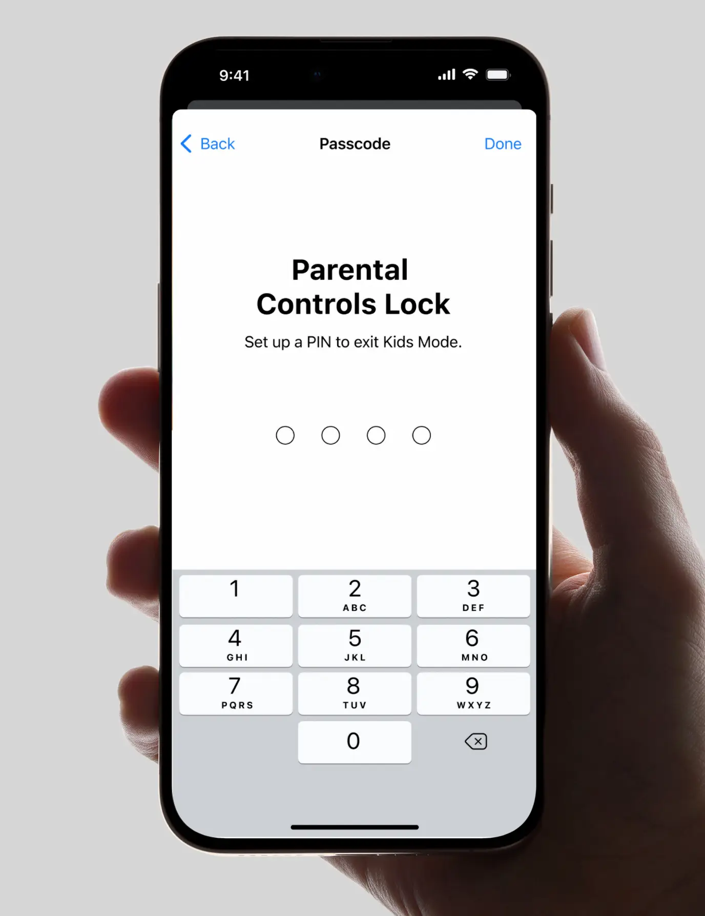 Hand holding iPhone displaying screen to set PIN for Parental Controls Lock in Kids Mode.