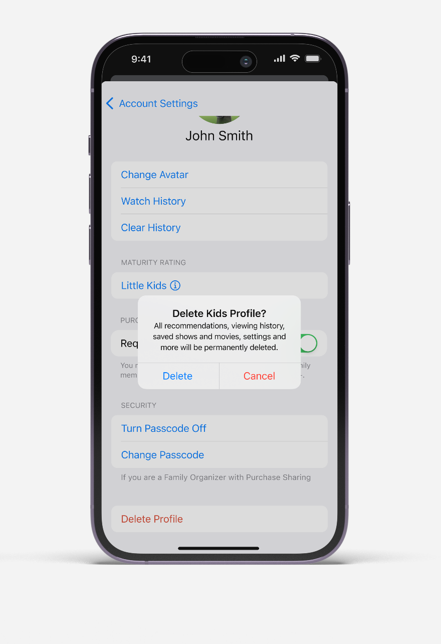 iPhone screen showing John Smith's account settings with pop-up to confirm deleting kids profile.