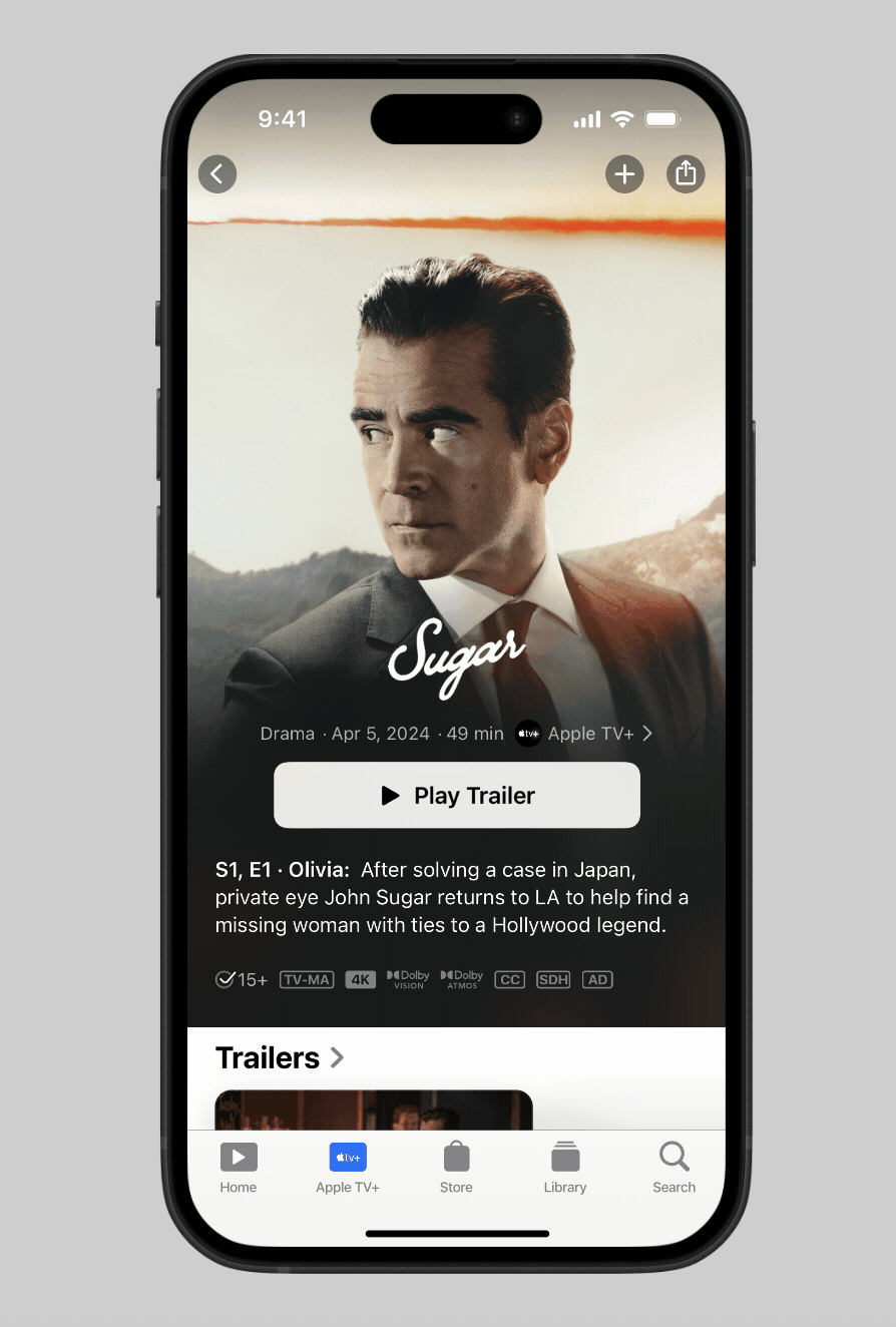 iPhone screen showing Apple TV+ series Sugar with a man in a suit and option to play trailer.