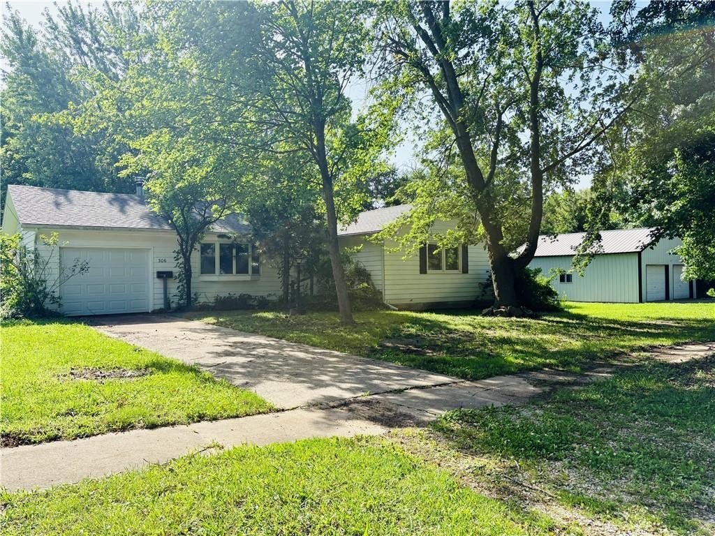 3/4 Acre in Town. Shop. Hardwoods. $125,000.