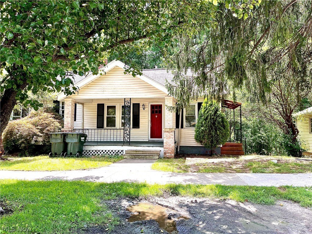 1920 Village Home. Walk-Out Basement with Fireplace. $135,000.