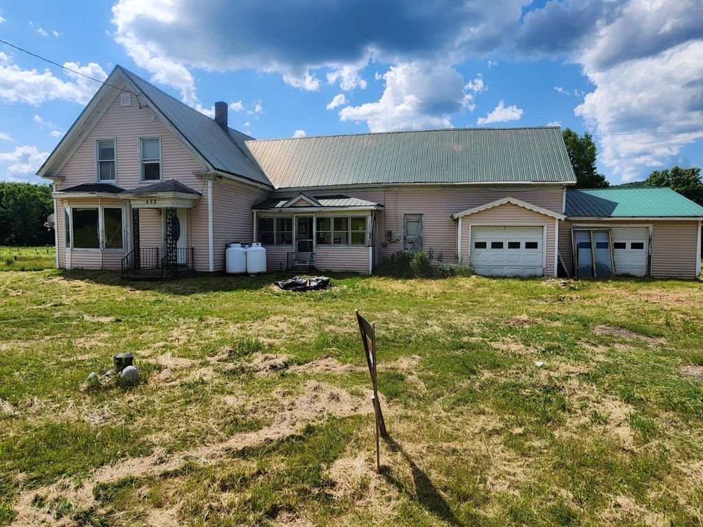 1900 Lowell Vermont Farmhouse with Mountain Views and Attached Garage — $92,500