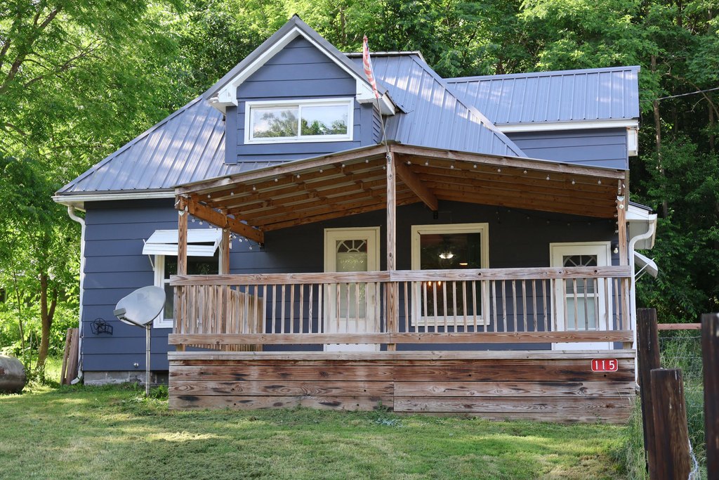 1900 Melvina Four-Bedroom with Steel Roof and Fenced Yard — $139,900