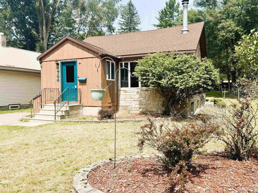 1931 Kingsford Home with Wood-Burning Fireplace and Updated Systems — $129,900