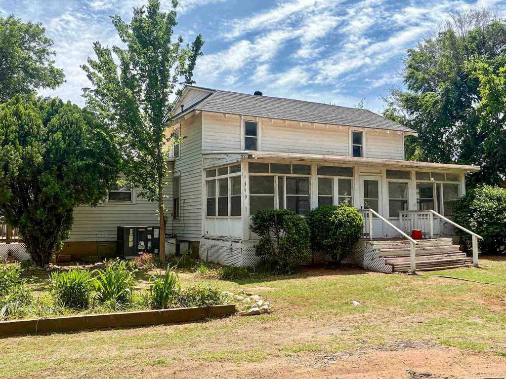 1910 Kingfisher Two-Story on Corner Lot with Screened Porch — $79,000