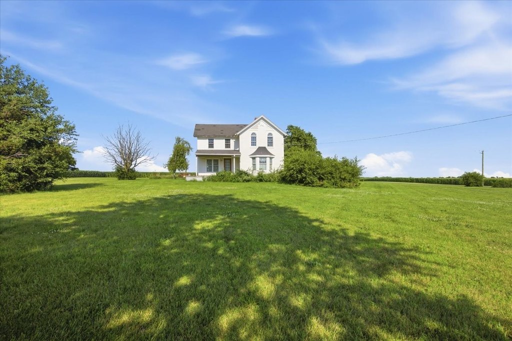 1908 Pontiac Farmhouse on 5.1 Acres with Outbuilding — $149,900