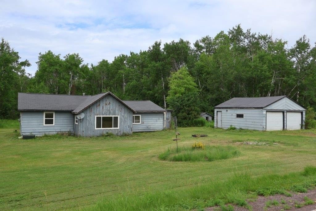 1920 South Range Home, Nearly 5 Wooded Acres, 9 Miles from Lake Superior — $84,900