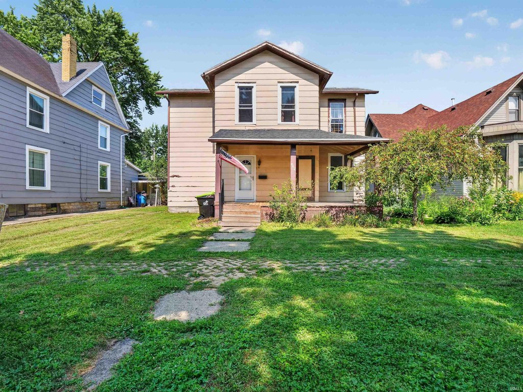 1918 Huntington Home with Two Kitchens and Duplex History — $94,500