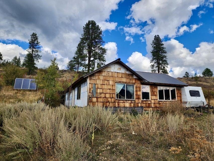 Off-Grid Solar Cabin on 10 Mountain-View Acres in Republic — $85,000