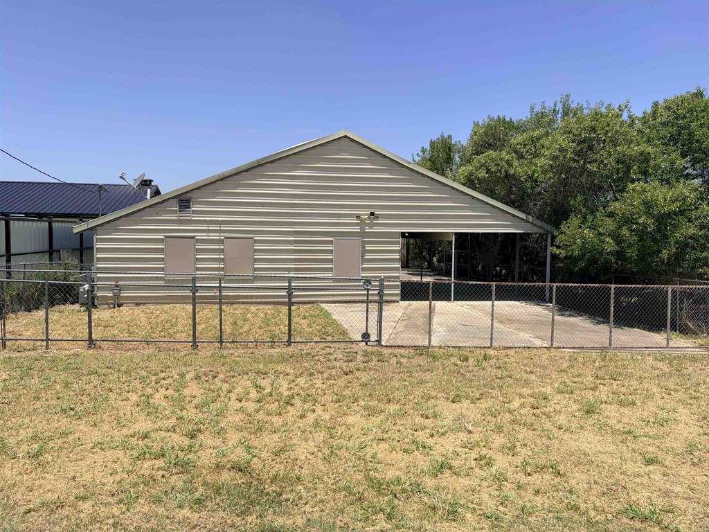 Furnished Lakefront Home with Pool, Boat Ramp Access, and Workshop — $108,000