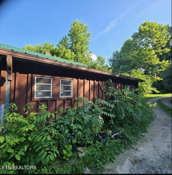 1910 Pioneer Farmhouse on 5.5 Acres Along Stinking Creek — $149,900