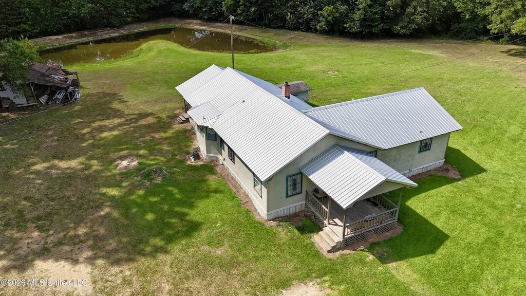 1953 Edwards House on 3.8 Acres with a Backyard Pond — $145,000