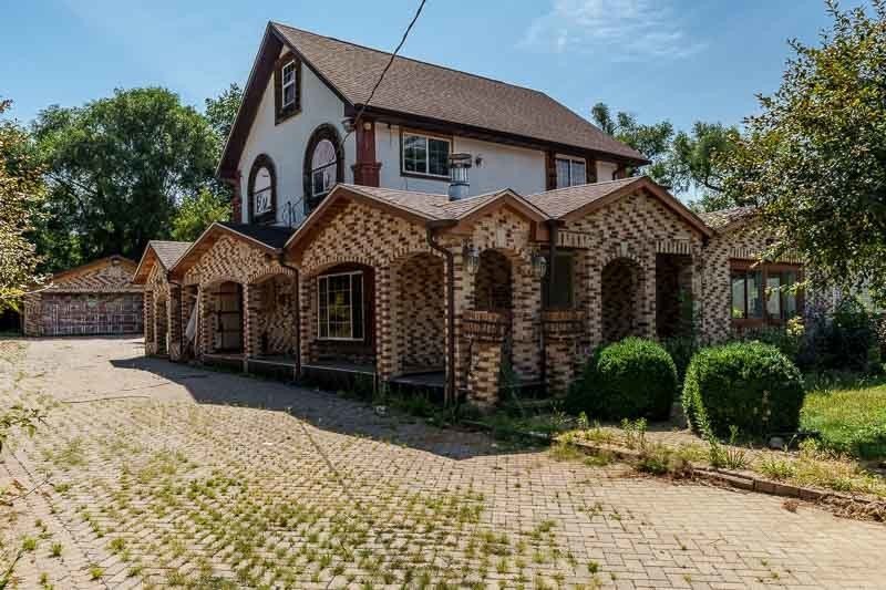 1940 Spanish Eclectic on Nearly Half an Acre, Three Lots — $115,000