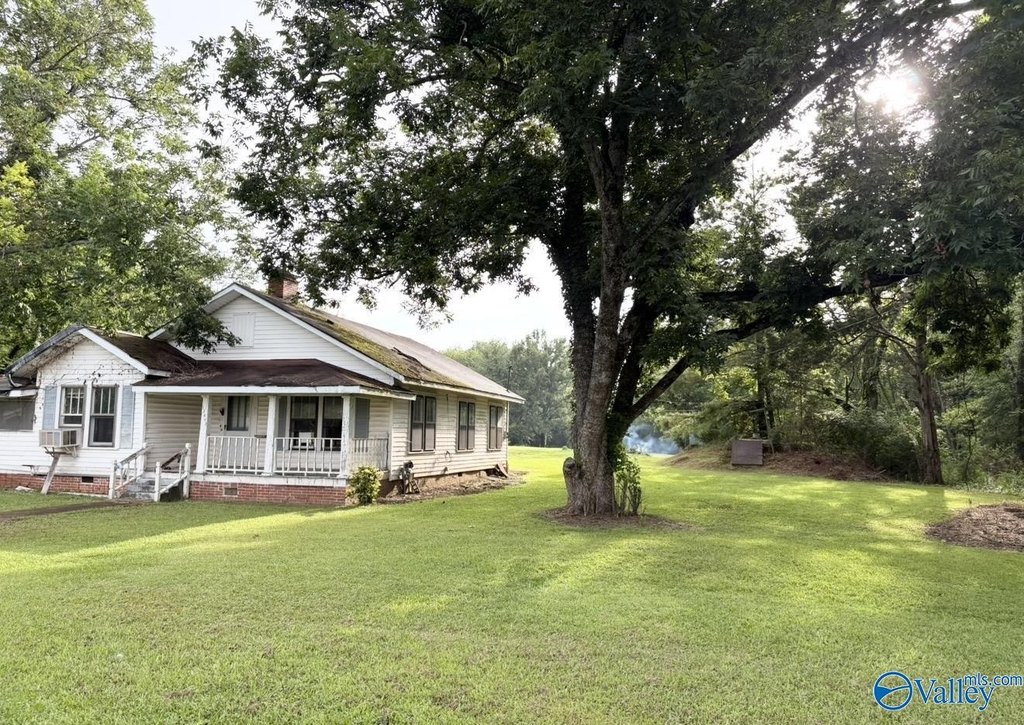 1970 Moulton Fixer on 3.5 Acres with a Private Pond — $99,900