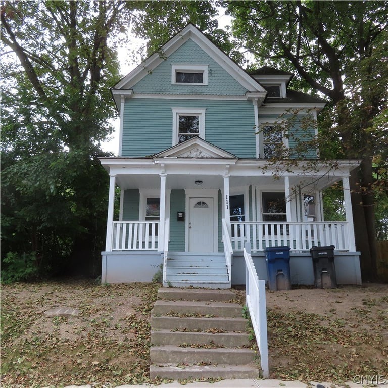 1920 Syracuse Five-Bedroom with Full Front Porch and Foyer — $129,900