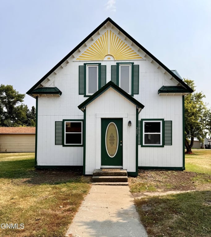 1908 Bowbells Two-Story with Extra Lot and New Metal Roof — $129,900
