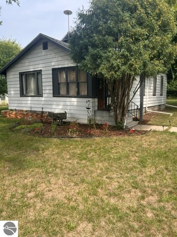 1920 Alma Home on 4 City Lots with Hardwood Floors Under the Carpet — $142,000