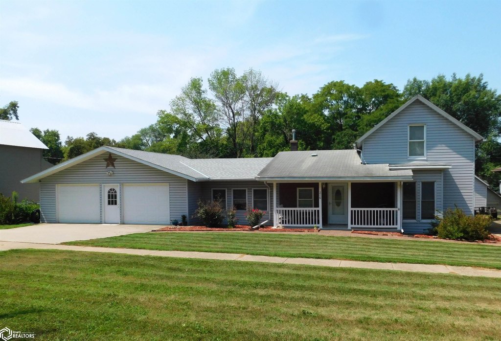 1889 Charter Oak Victorian with Oversized Garage and New Deck — $149,900