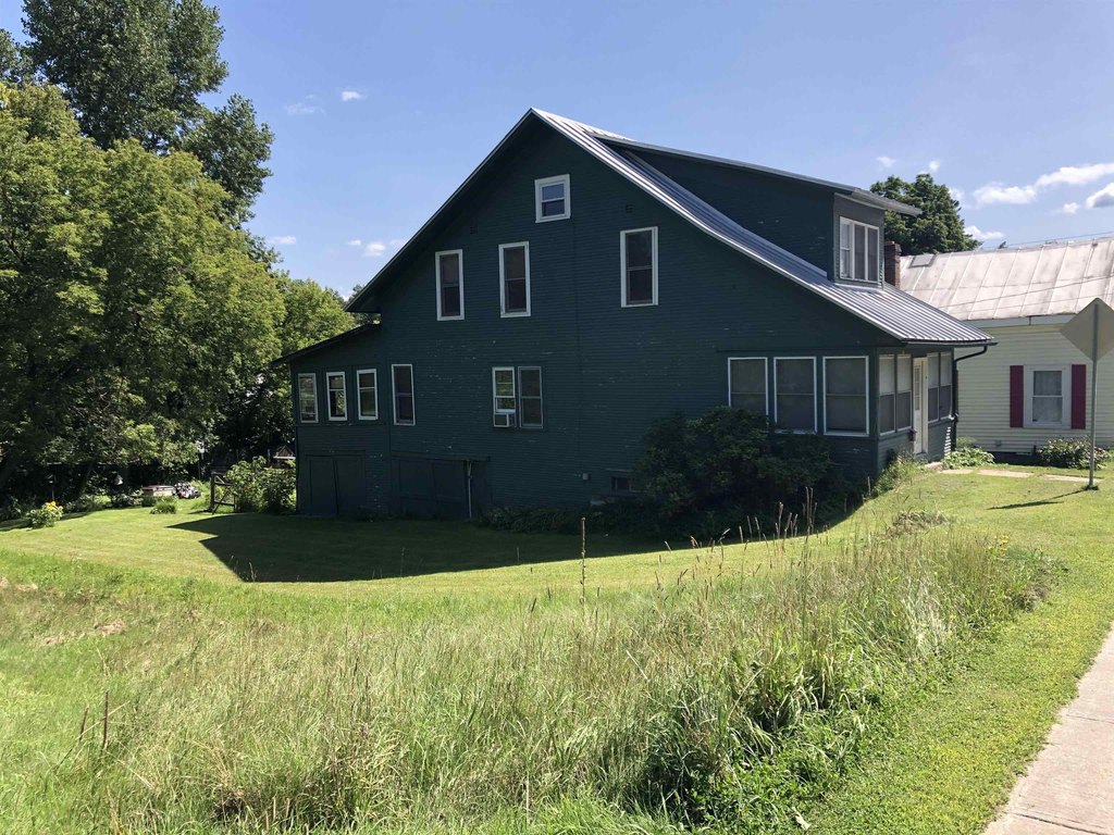 1920 Richford Arts & Crafts Bungalow with Porches, Garage, and Attic — $129,000