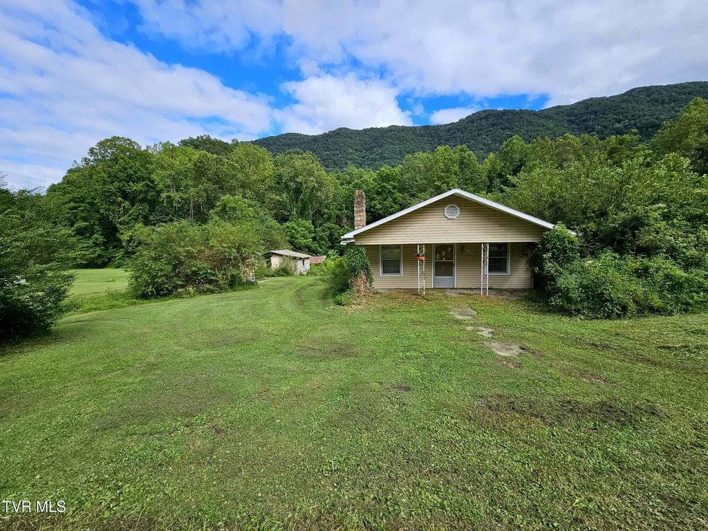 1923 Mountain Tract with Creek, Views, and Outbuildings — $59,000
