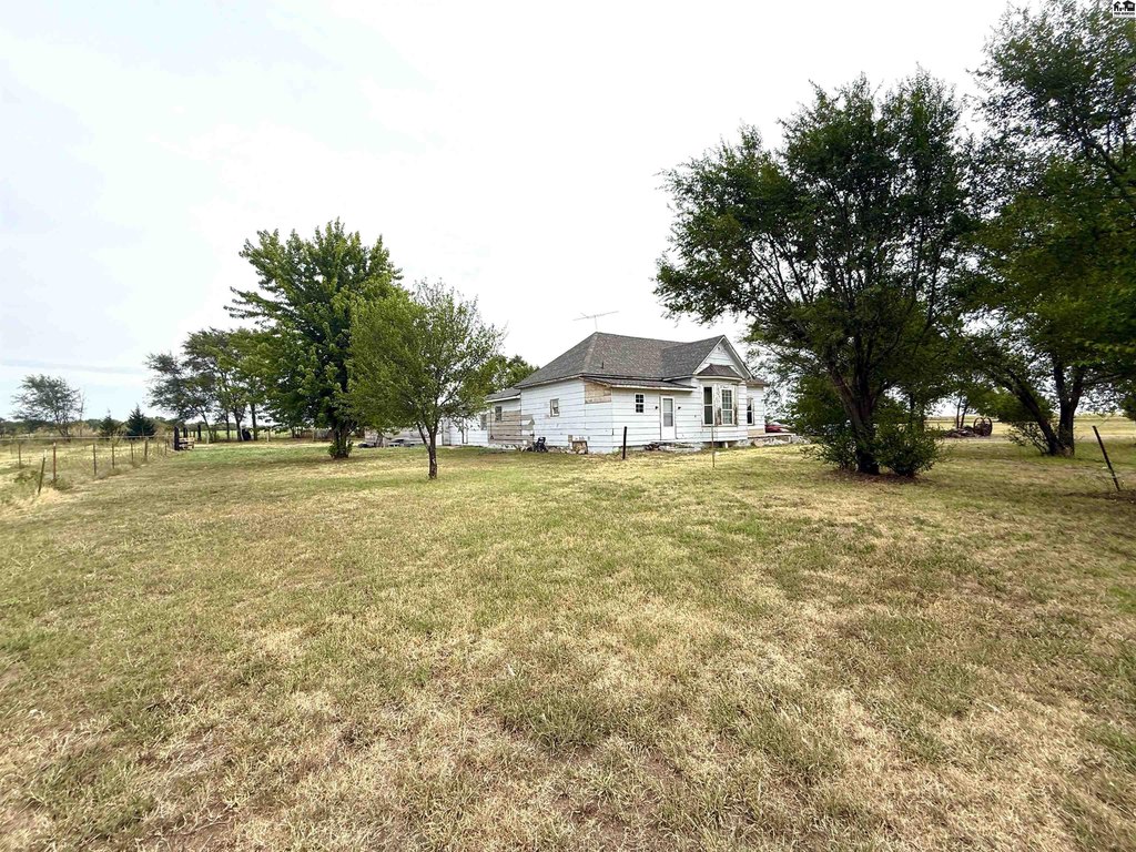 3.2 Acres, New Roof, 3-Car Garage, and Room to Work — $89,000