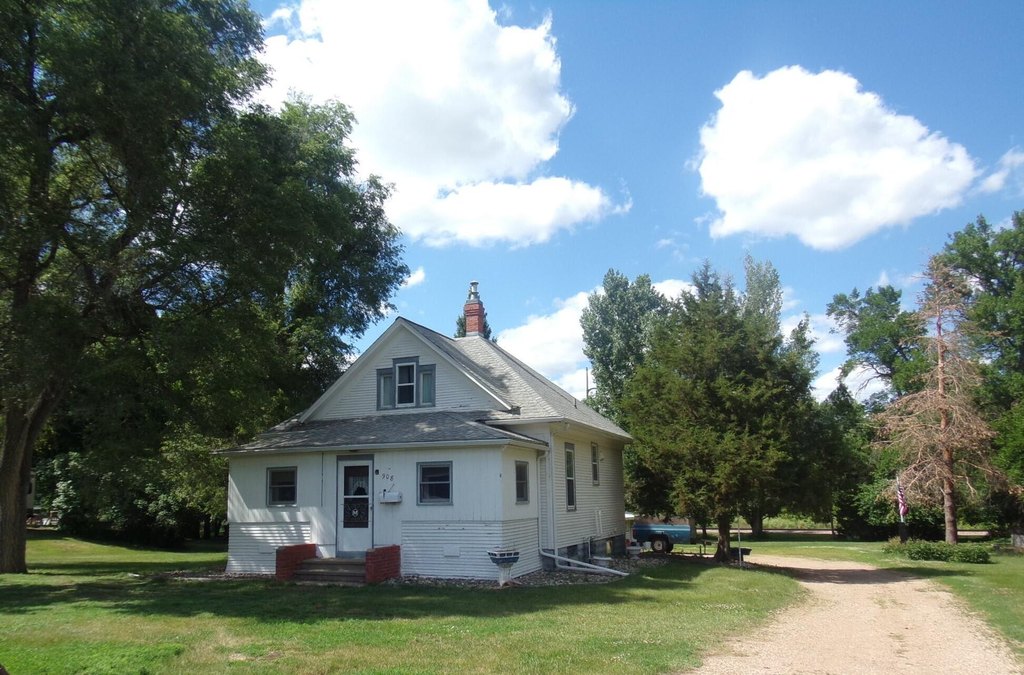 1915 Mitchell Home, 50 Years One Family, 0.69 Acres in Town — $119,000