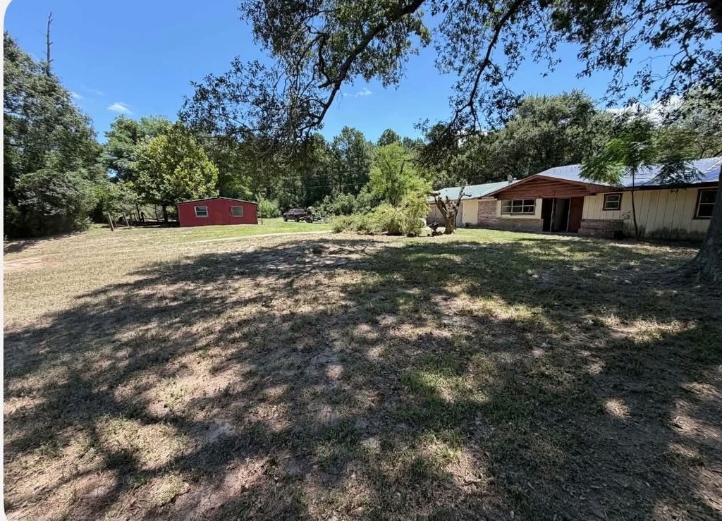 1973 Brick House on 5.75 Acres Near Groveton City Limits — $99,900