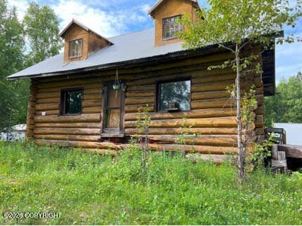 1961 Nikiski Lot on Private Airstrip with Quonset Hut — $140,000