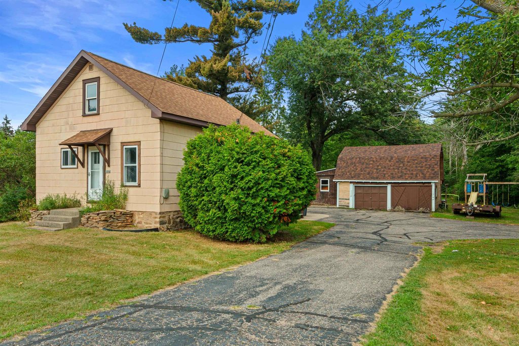 1938 Wisconsin Rapids House on 0.76 Acres with Detached Garage — $125,000