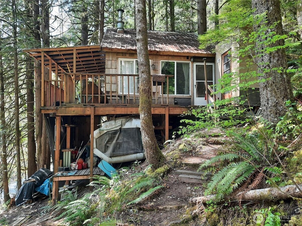 1969 Off-Grid Cascade River Cabin with Solar, Views, and Materials Included — $59,000
