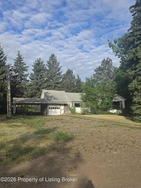 1920 Home on 1.52 Treed Acres Across from Mirror Lake — $99,900