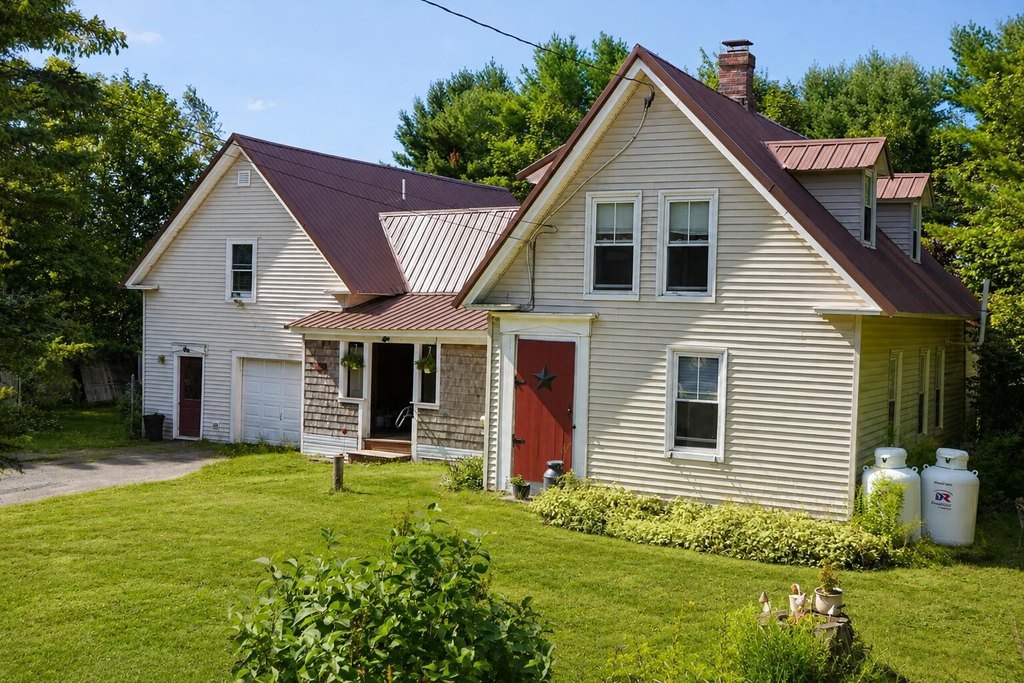 1900 Detroit Maine Farmhouse with Legal In-Law Apartment Above Garage — $129,900