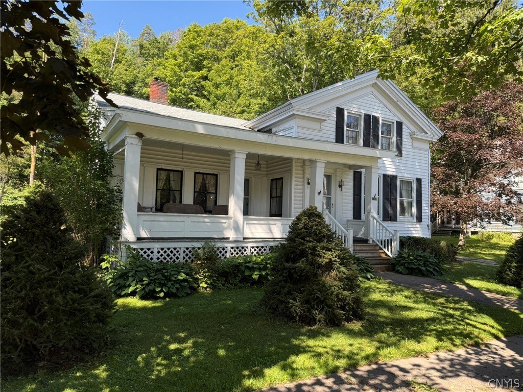 1890 Remsen Home with Clawfoot Tub, Generator, and Covered Porch — $145,900