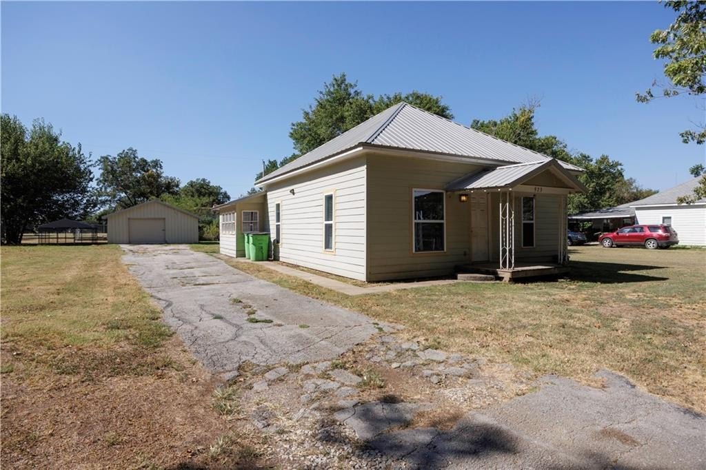 1915 Cherryvale Home on Nearly Half an Acre with Two Outbuildings — $99,000