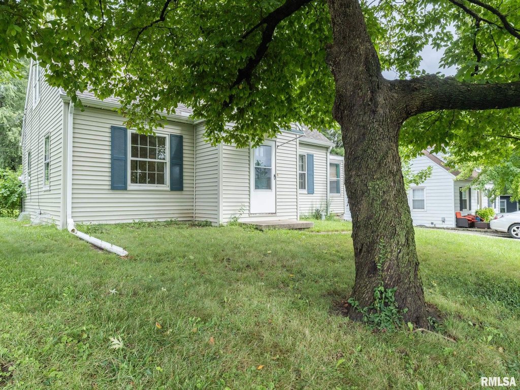 1950 Peoria 1.5-Story with Hardwood Floors Near Rock Island Trail — $97,900