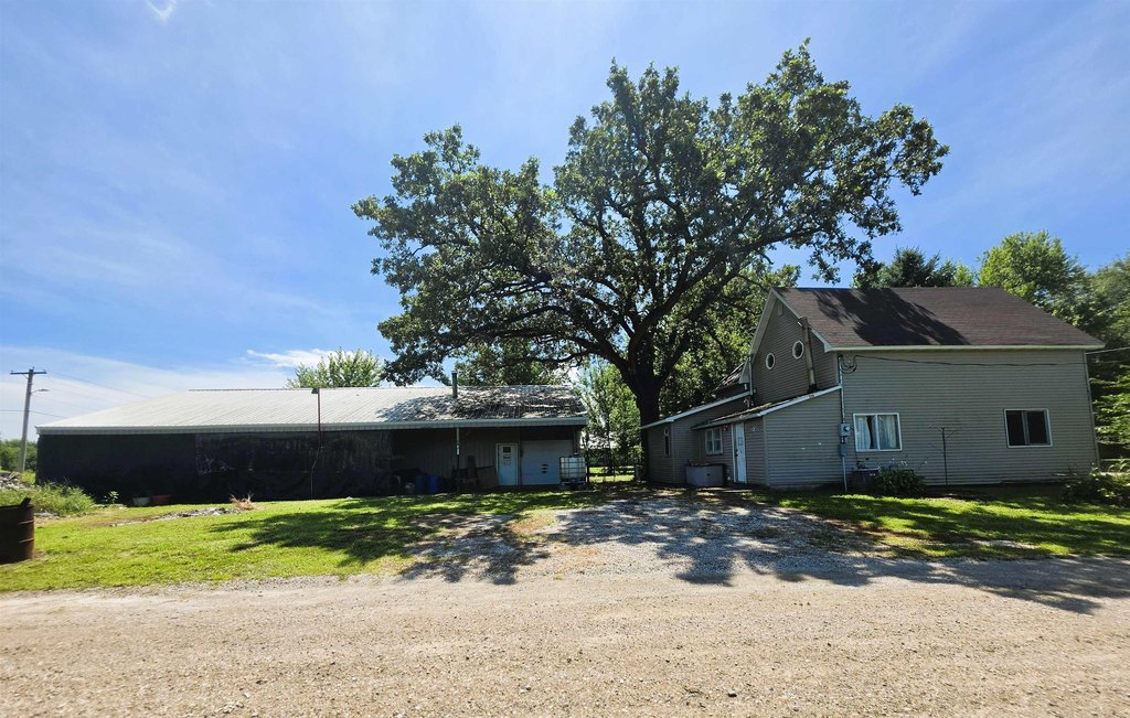1900 Traer Home with a 30x72 Insulated Shop Out Back — $149,900
