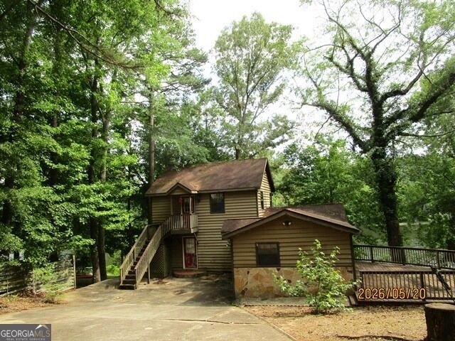 Private Dock, 1.39 Wooded Acres, Lake Access — $75,000