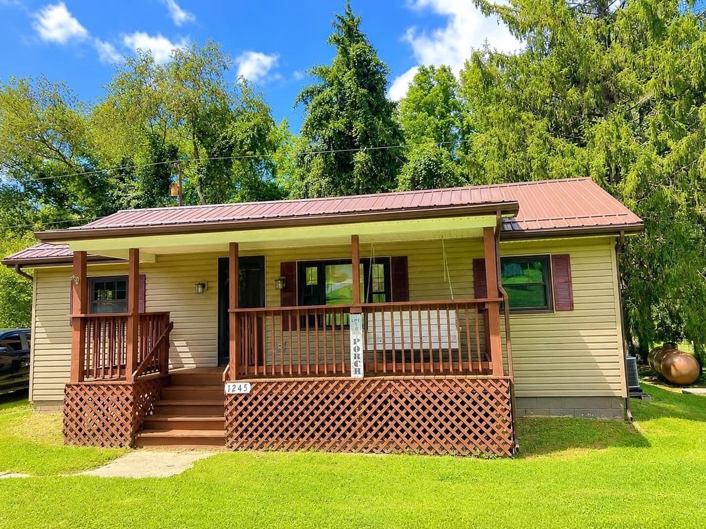 1955 Chillicothe Home with Creek, Wooded Lot, and Original Woodwork — $125,000