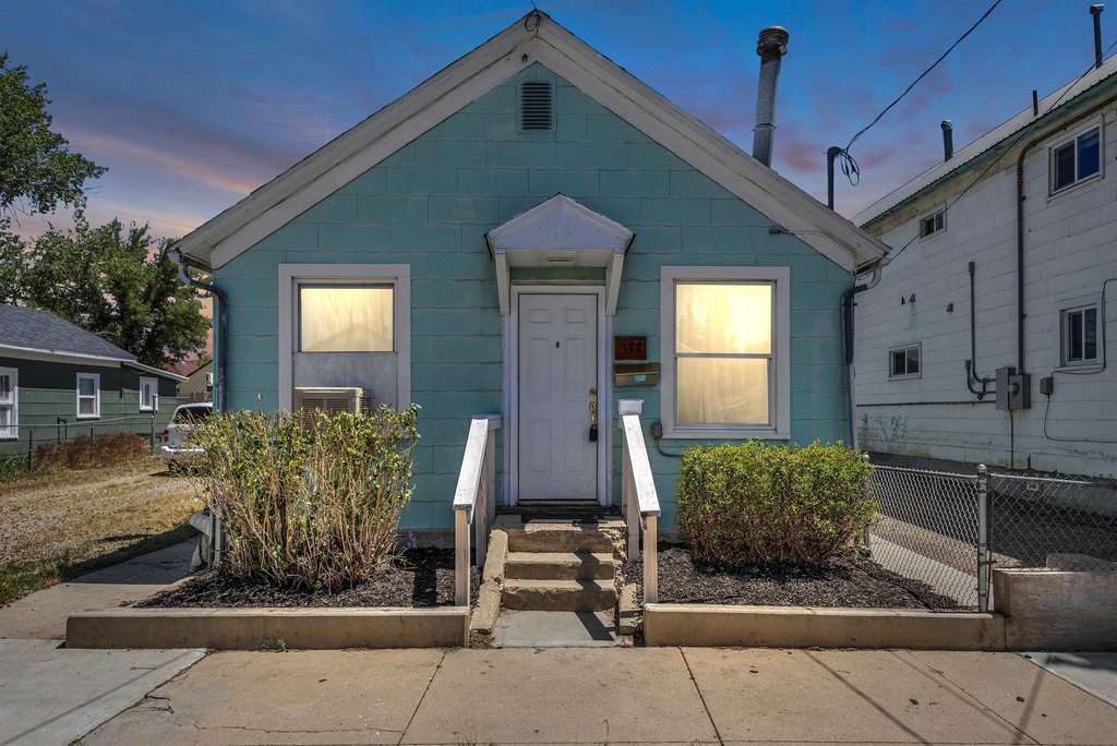 1900 Rock Springs Home with Hardwood Floors and RV Parking — $140,000