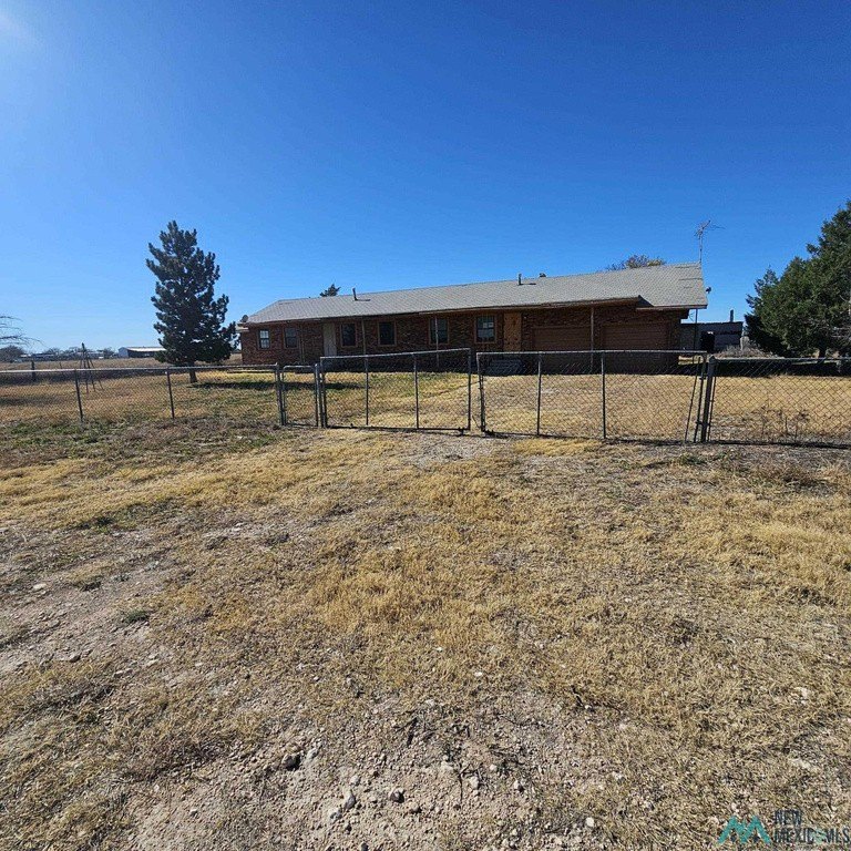 12 Acres Outside Portales with a House on Top — $74,900