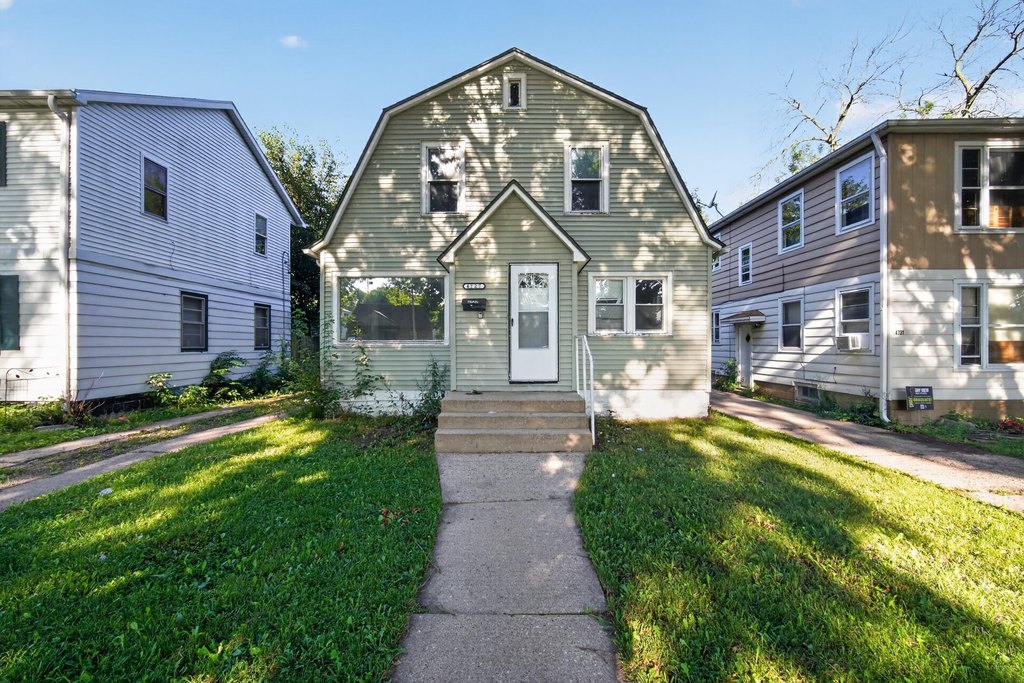 1928 Milwaukee Story-and-a-Half, 4 Beds, Natural Wood Trim — $134,900