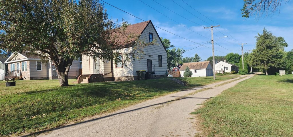 1938 Sunburg Home with Original Hardwood, New Heat Pump, Big Garage — $99,900