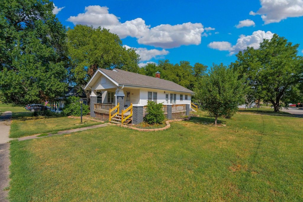 1928 Wellington Craftsman with French Doors and Wraparound Porch — $142,900