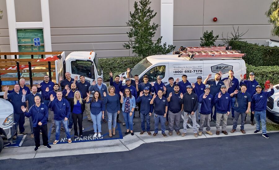 The WP Electric team outside the headquarters