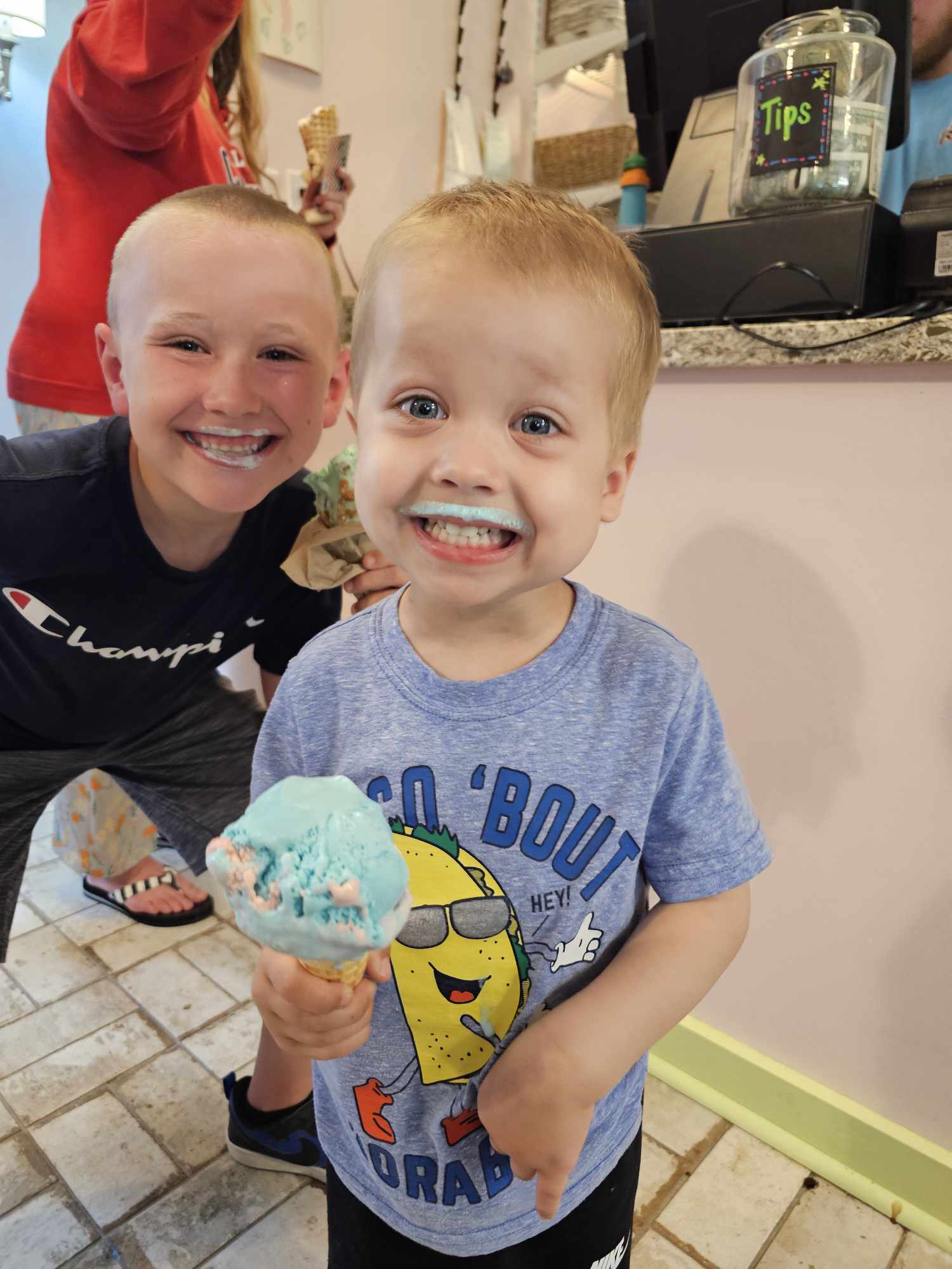 Luke enjoying ice cream with a friend